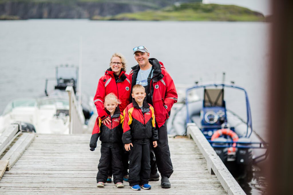 family friendly whale boat tours. Photo features Kris and Shawna Prince of Sea of Whales adventures with their children.